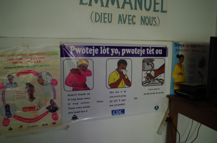 a Creole health poster advocating for covering your mouth and nose when coughing or sneezing
